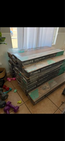 STAINMASTER PetProtect Cheltenham Hickory 12-mm T x 7-1/2-in W x 50-in L Waterproof Laminate Wood