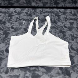Lululemon Reversible Bend This V and Racer Bra  The lululemon Bend This V and Racer Bra in white size XXS is specifically designed for women with A-C 