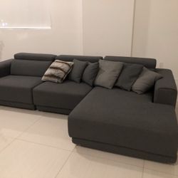 Gray living room sofa of the German brand Kare