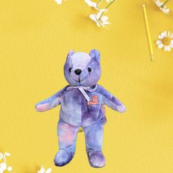 Ty beanie baby Freedom the bear.purple tie-dye bear w/ American flag on its chest collectible toy. 