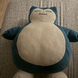 Large Pokémon Snorlax plush.