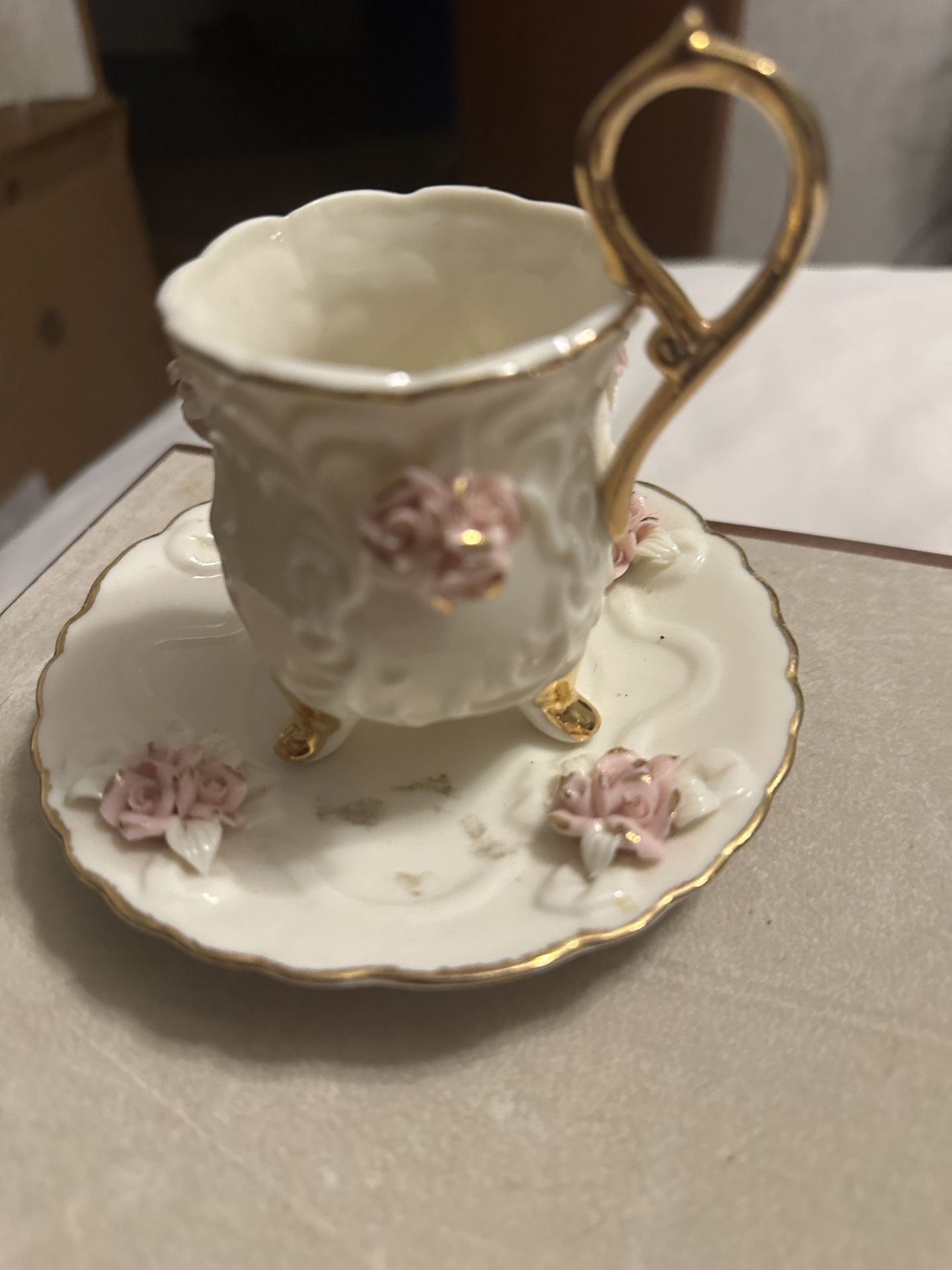 Porcelain tea cup with saucer