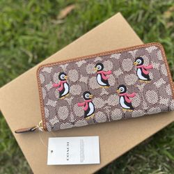 Coach Accordion Zip Wallet In Signature Textile Jacquard With Penguin Motif