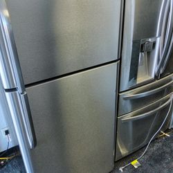 2 yrs old Frigidaire stainless steel apartment size refrigerator and top freezer