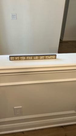 Sit by fire and get toasted sign decor