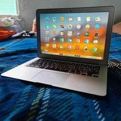 Excellent 13 inch Apple Macbook Air Laptop With Intel Core i5 Processor With Programs 