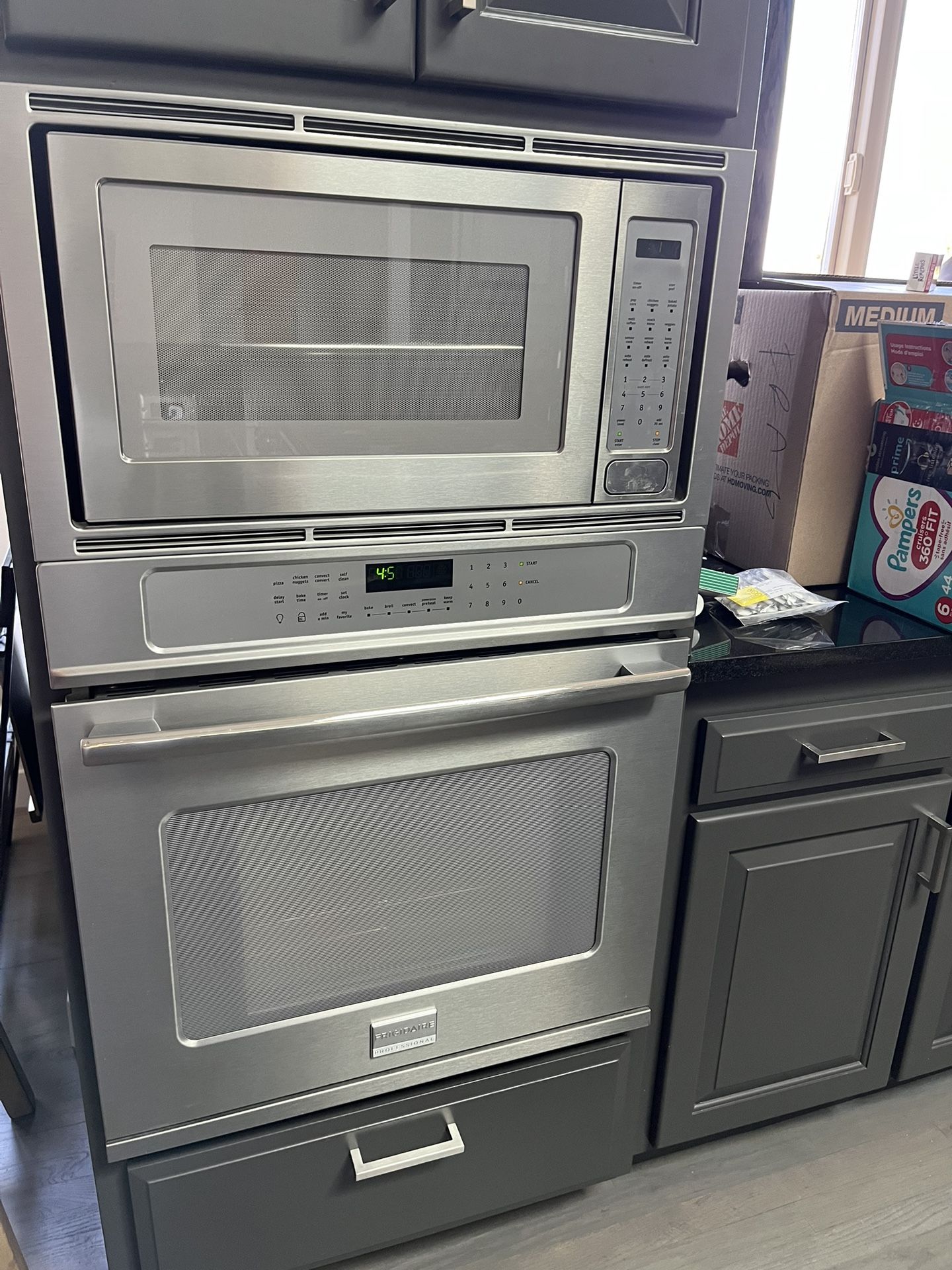 Microwave, Oven And Gas Stove Top With Down Draft