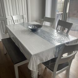 Kitchen Table With Bench Also Countertop With Three Stools