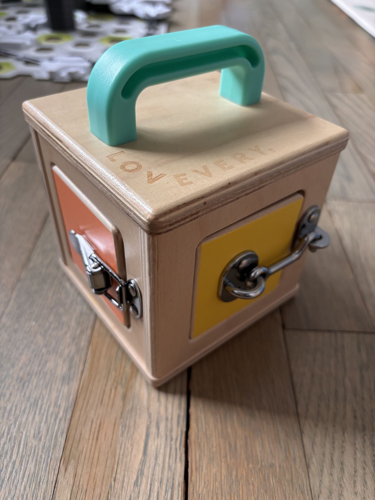 Lovevery 19-21 months wooden box with four different locks