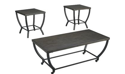 Brand new Coffee and end table from Ashley’s Furniture