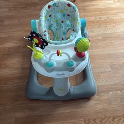  blue/ white kolcraft baby walker 