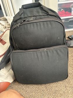 Black Canvas Backpack with Multiple Compartments