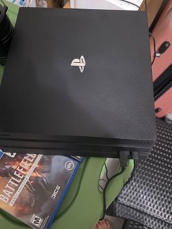 Sony PlayStation 4 Pro PS4 Bundle – Controller, Charging Dock + 3 Games