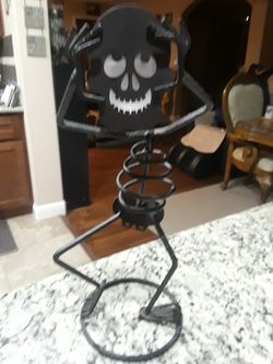 PartyLite skeleton iron votive holder