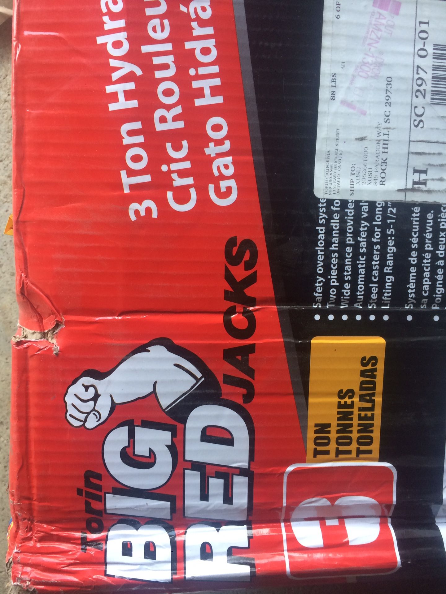 New 3 ton floor jack still in the box