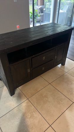 Tv stand wood dark brown holds a tv up to 55