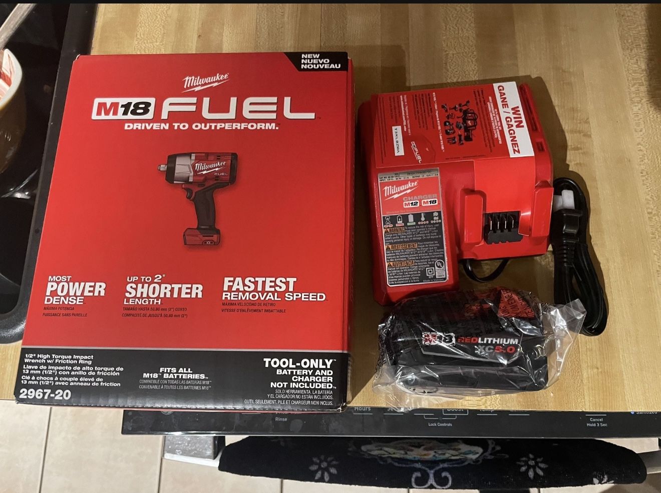 Milwaukee 1/2” impact wrench 1600 Nut breaking torque with (1) 5ah batt and charger all new $450firm
