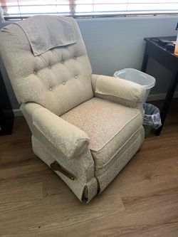 2 light yellow recliners
