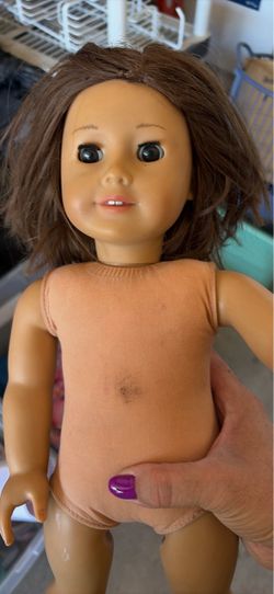 American girl doll with furniture and clothing and accessories for sale
