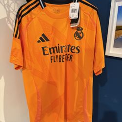 Real Madrid 24/25 Away Jersey orange