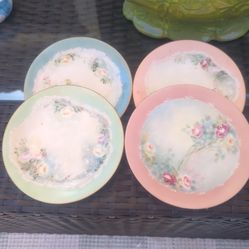 4 hand painted dishes