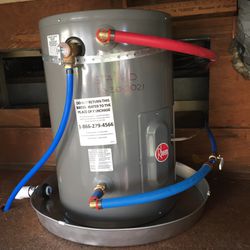 New in the box water heater electric 10 gallons, 120volt, 16.67amp, 2000watts, for RV or travel trailer with installation only