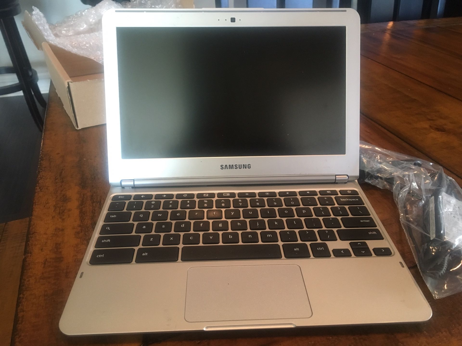 Samsung Chromebook 11.6” Silver-bought refurbished new. Still in box...we never used it. 2003;16 GB LED. Has a few scratches on exterior but in great
