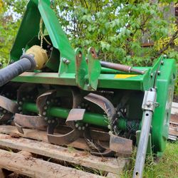 John Deere 1023E Tractor With Rototiller And Forklift 