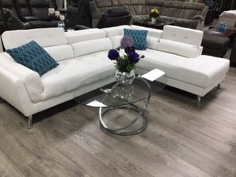 White sectional. Financing available. No credit needed