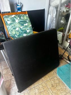 Black foldable picnic tables