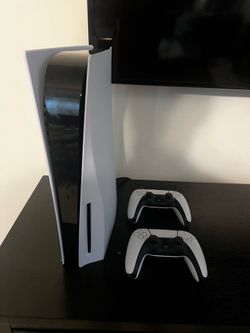 PS5 Console, 2 controllers, HDMI cable and 1 controller charger cabl le