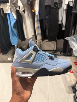 Air Jordan 4 University Blue Sneakers