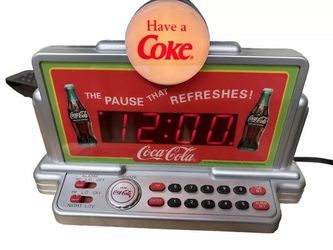Vintage 1990's coca cola alarm clock lights up! Table top plug in never used located in palm springs ca perfect