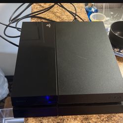 PS4 With Cables And Two Remotes With Charging Station