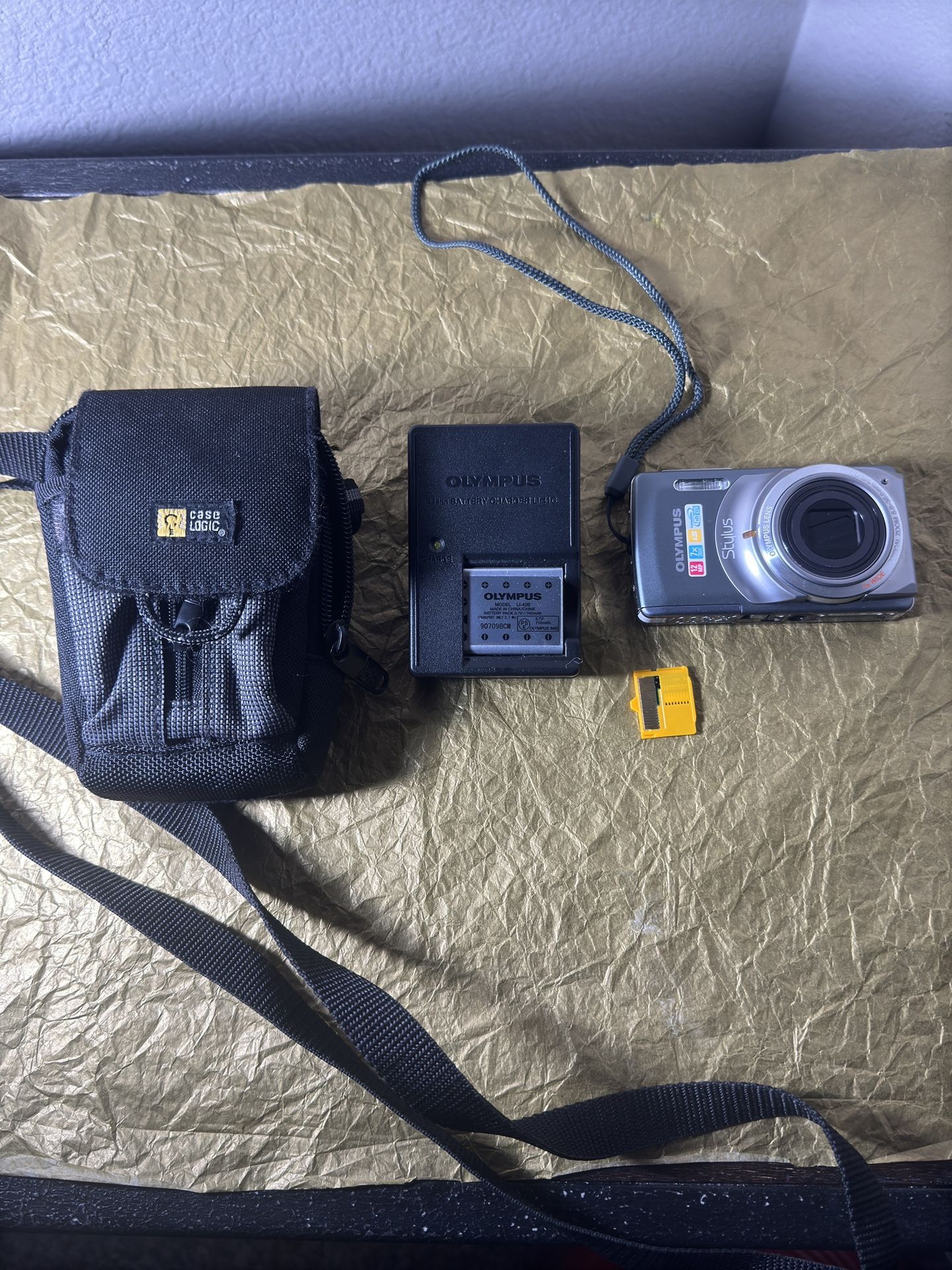 Olympus Stylus 7010 12MP Digital Camera w/7x Zoom Lens