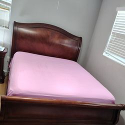 Used queen-sized bed
