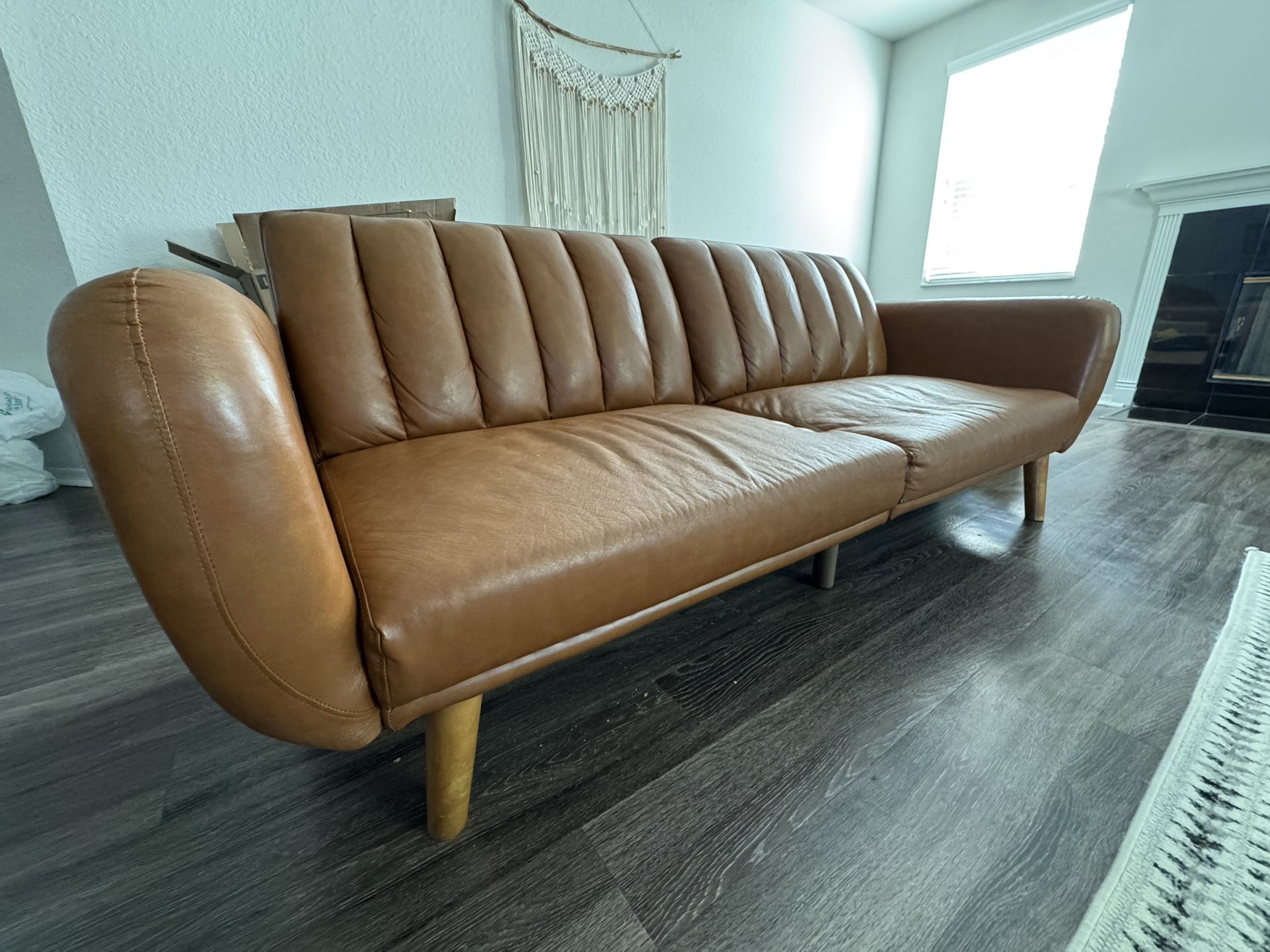 Novogratz Brittany 82 Inch Futon Sofa Bed in Faux Leather, Upholstered Couch Sleeper with Tufted Back, Mid-Century Modern Design, Brown