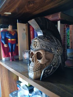 Trojan roman skull figurine