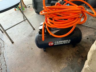 Lawnmower and an air compressor