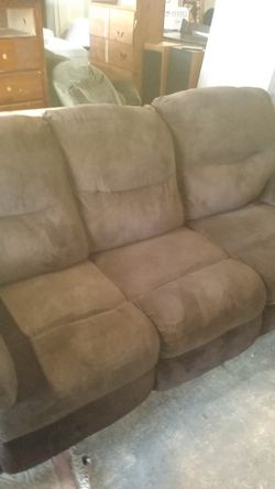 Brown reclining sofa