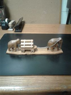 WOODEN ELEPHANT PULLING LOGS SCURPTURE