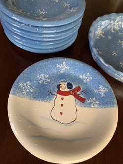 Holiday Dish Set: 7 snowflake dessert plates, 2 snowman dessert plates, and a pie dish