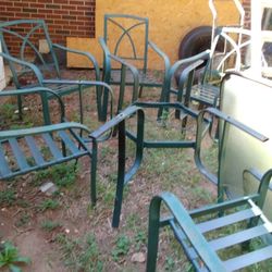 Patio table with 6 matching chairs.