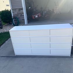Modern white 12-drawer dresser  32” H x 63” W x 15.75” D