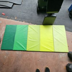 Green foldable gymnastic mats