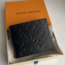 Black Louis Vuitton wallet* NEGOTIABLE*