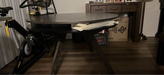 Round dark wood chevron dining table