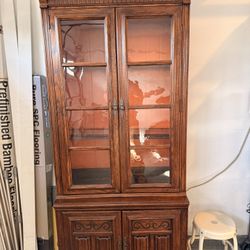 Ethan Allen Royal Charter Oak Jacobean-style two-piece corner china cabinet hutch. 