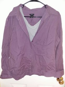Purple long sleeve jacket with a grey short sleeve top under