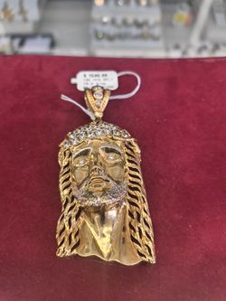 10k Gold Jesus pendant 18.2 grams CZ stone layway available 10% down if you interested please make sure you ask for Maribel thank you